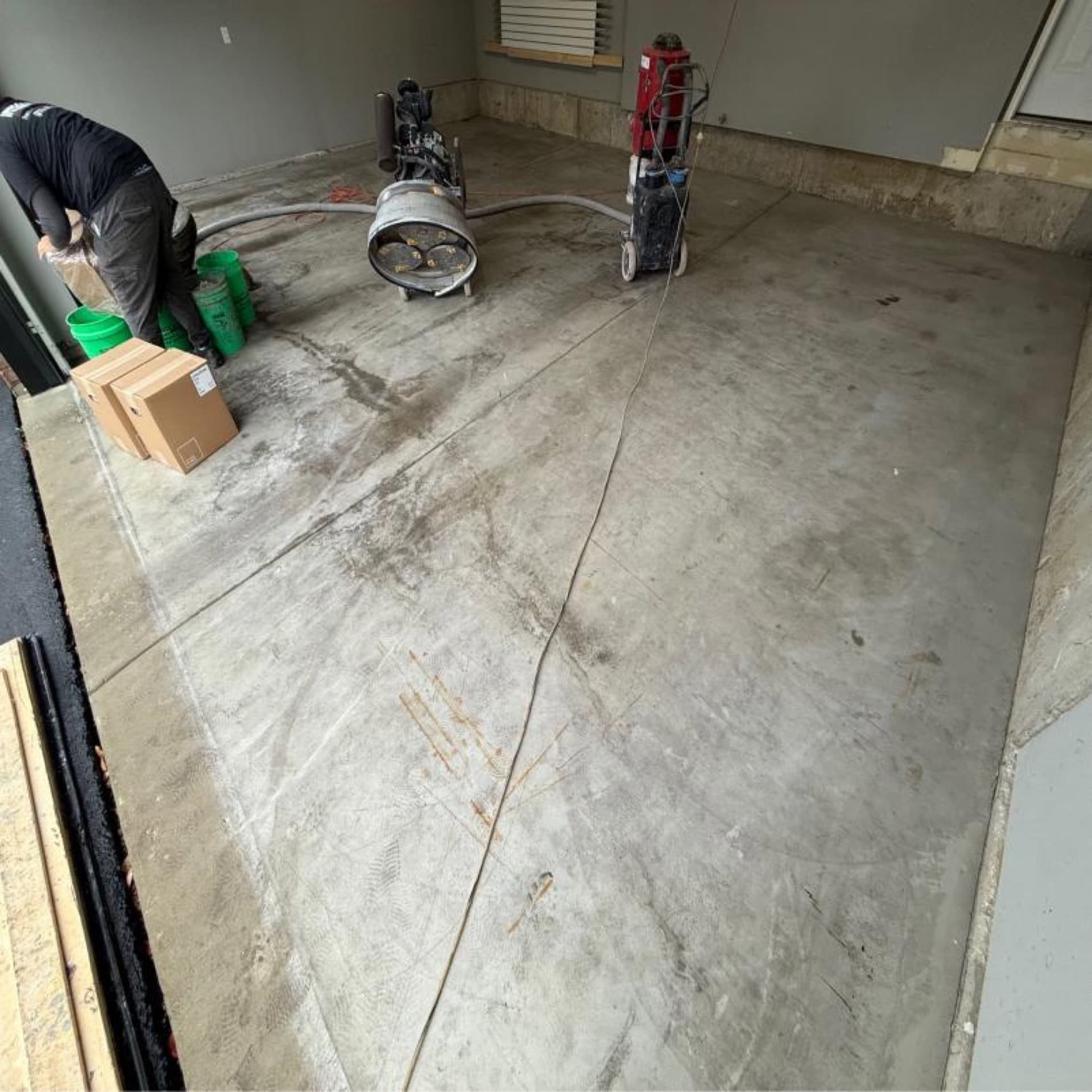Before: Stained cracked garage floor — Greater Cleveland OH