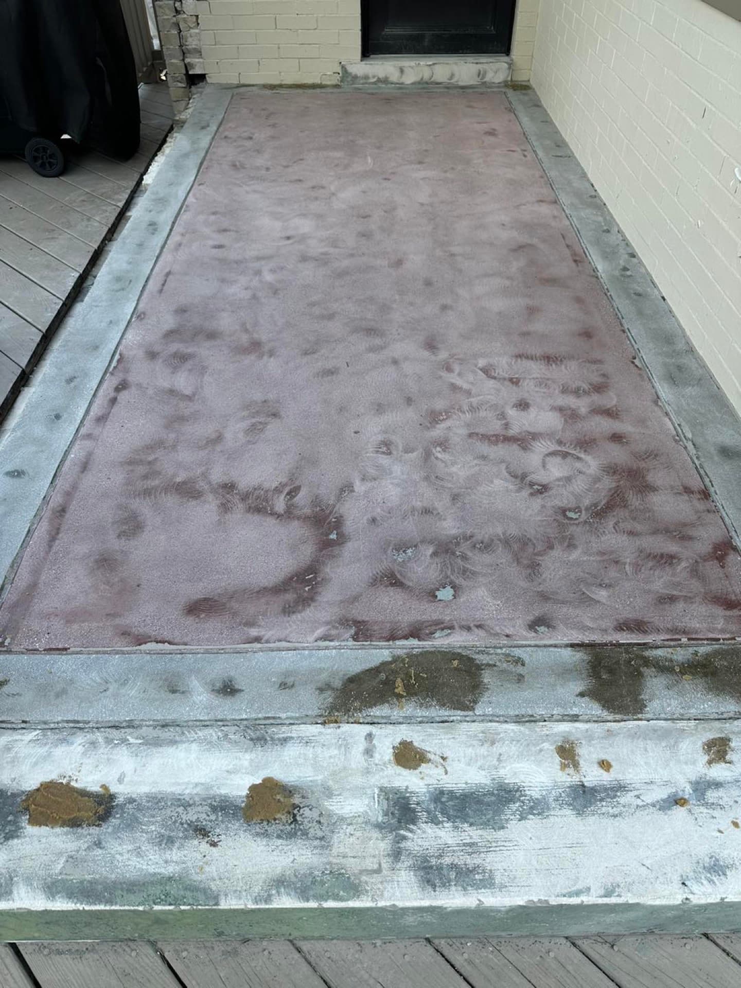 Brick-wall front entryway polyurea coating — Strongsville, OH
